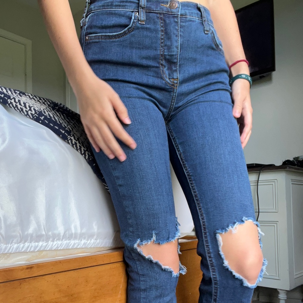 knee ripped jeans from free people.